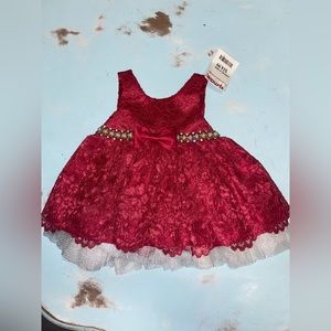 Red 6 month dress. New with tags.